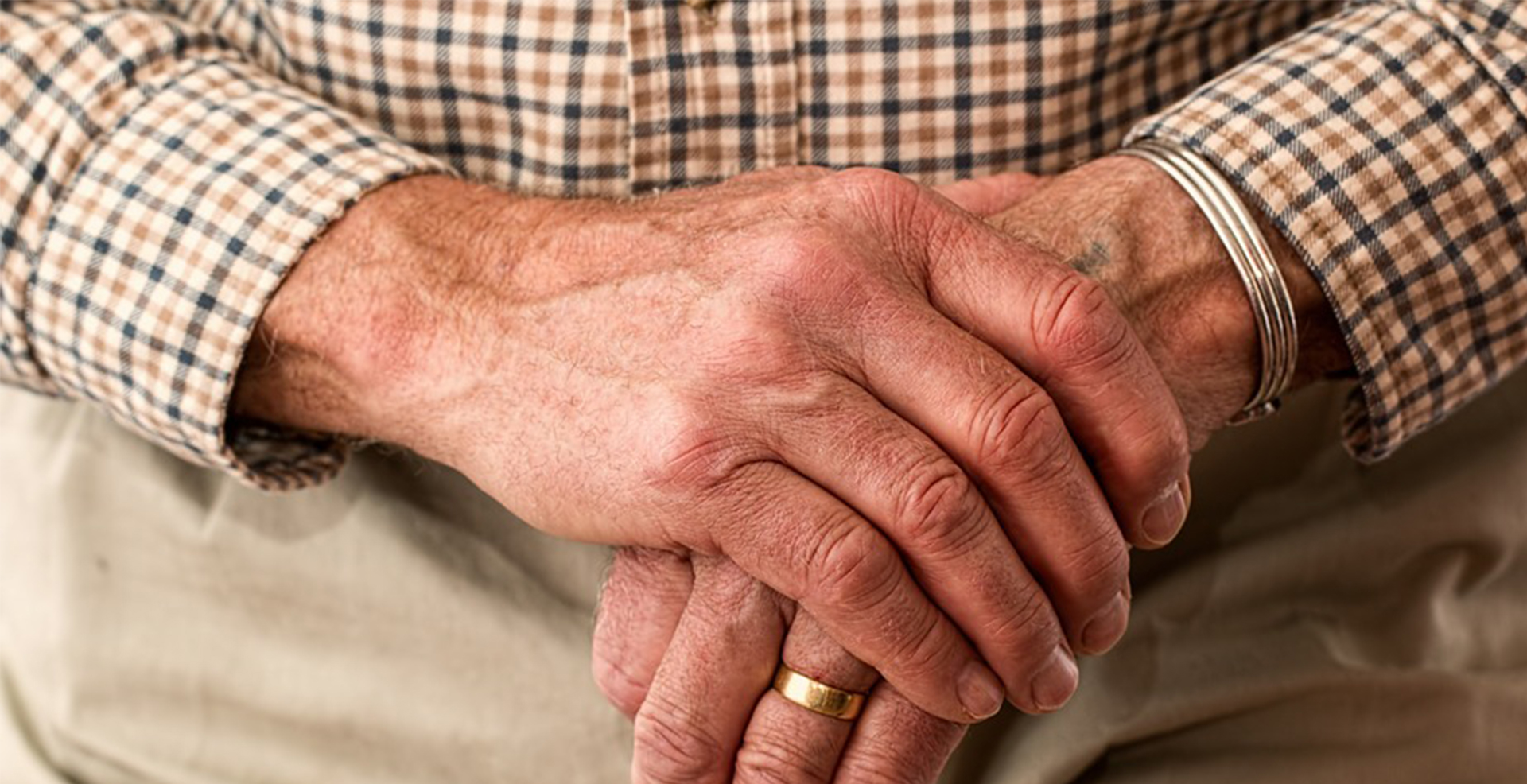 closeup of woman's hands clasped together