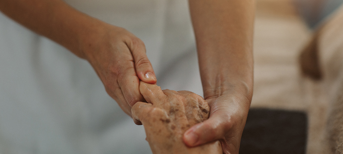 Close up of massage on elderly hand