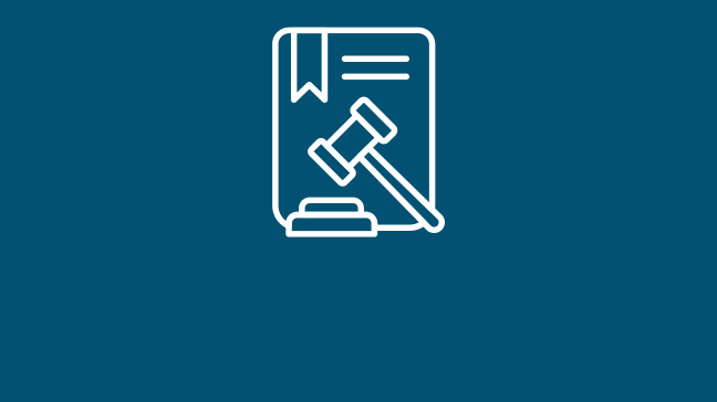 an icon of a piece of paper with a gavel on it.