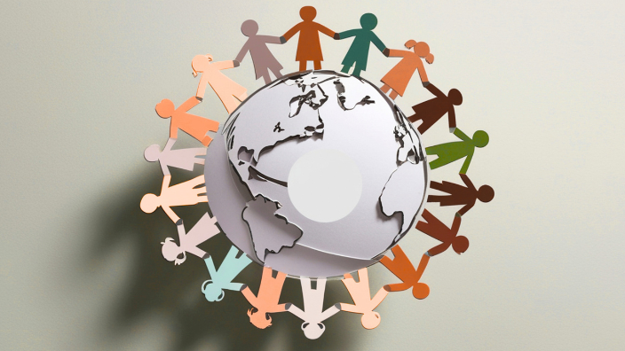 an graphic of the Earth with humans holding hands in a circle around it.