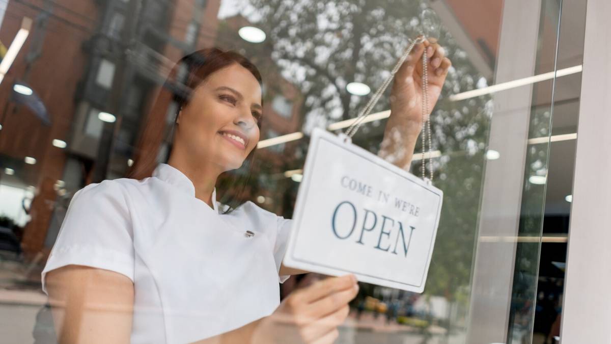 Person opening a shop