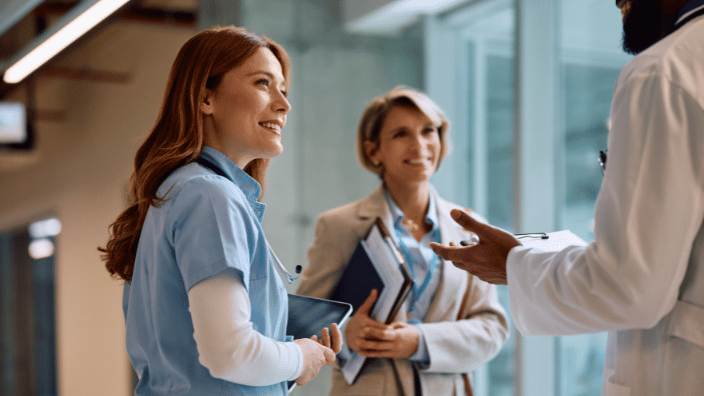 two women talking to healthcare provider