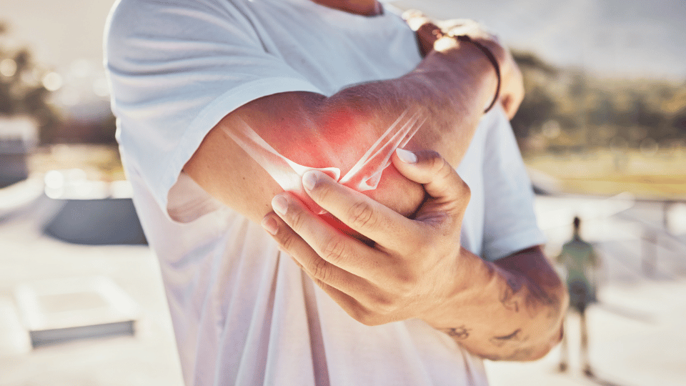 man with elbow pain