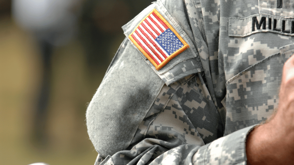 arm of military member in uniform