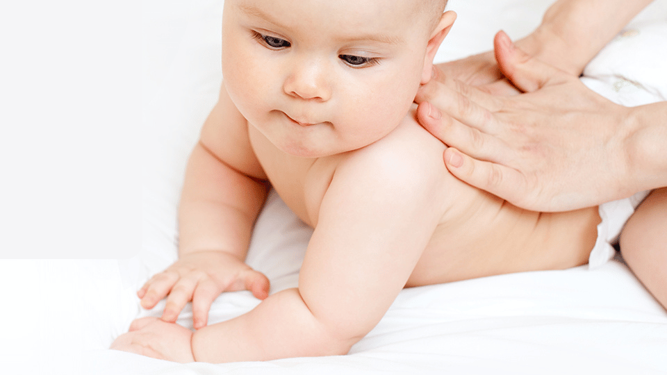 baby receiving massage