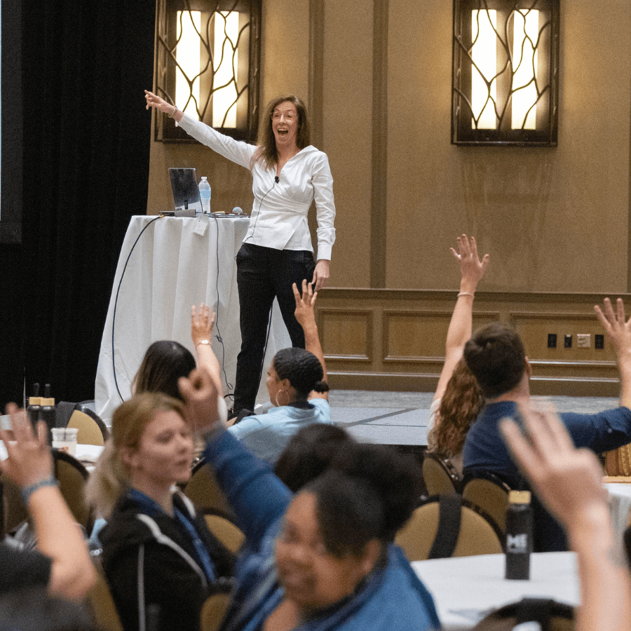 Heather Ashley Hayes speaking onstage at Student Day