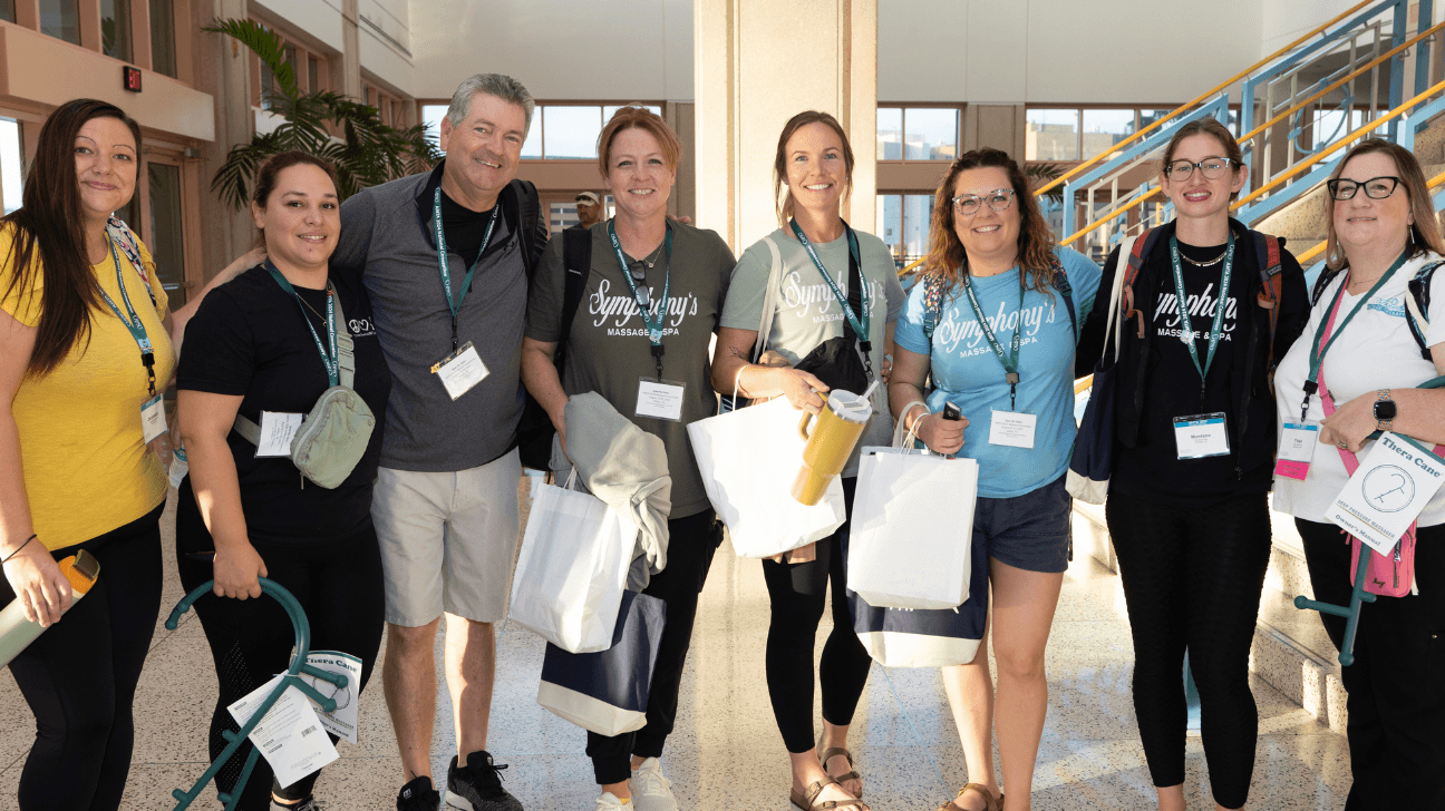 Group of AMTA Professional members smiling at the camera