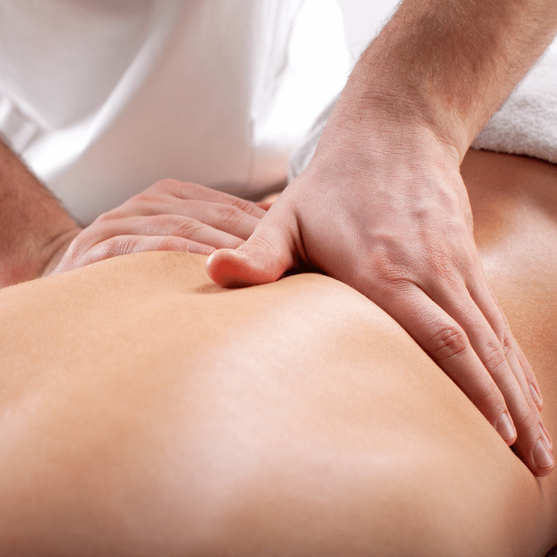 massaging client's back