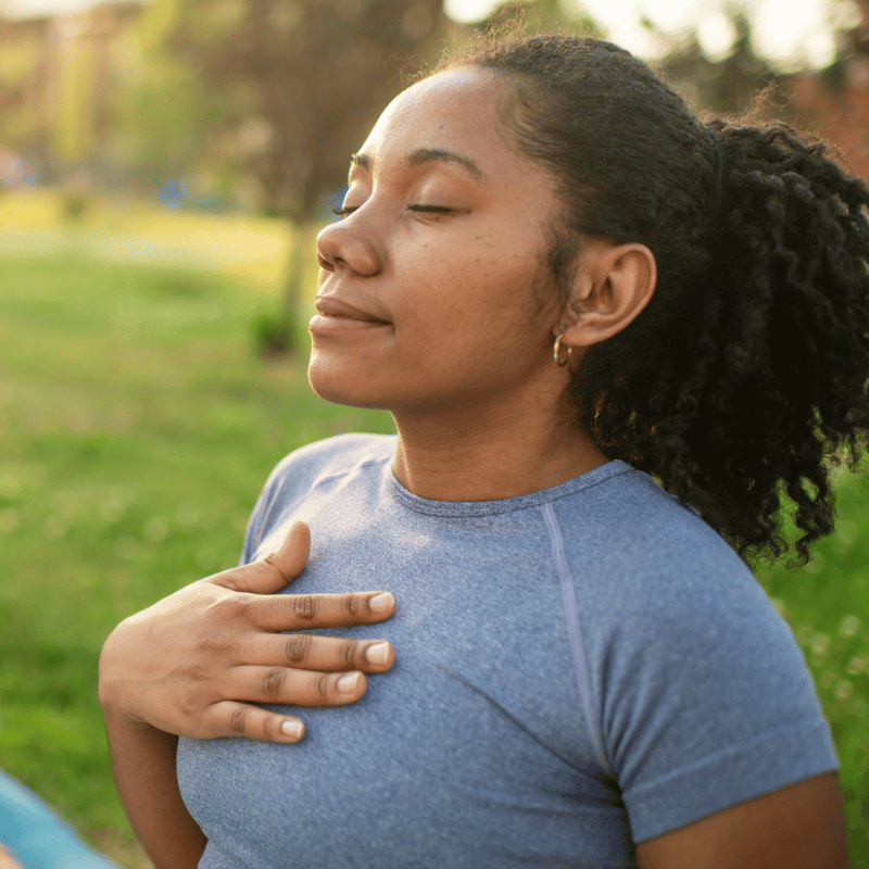 woman practicing deep breathing