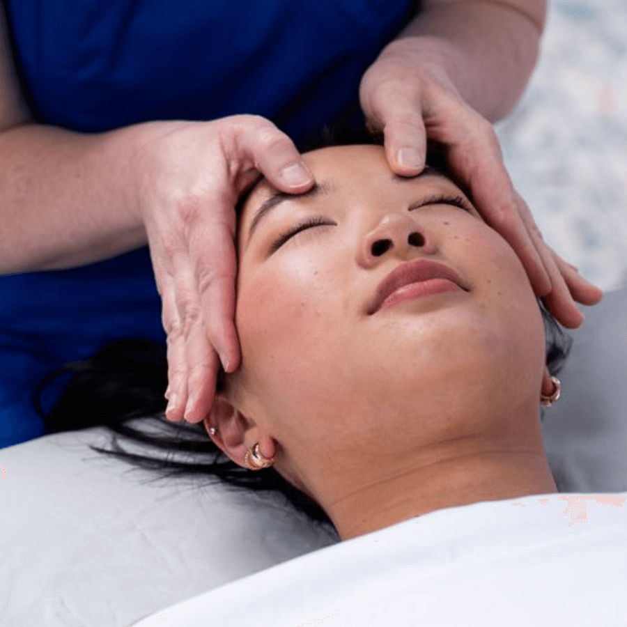 Woman getting head massage