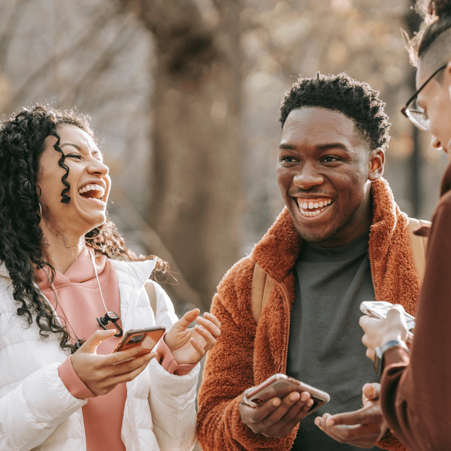 friends smiling at each other