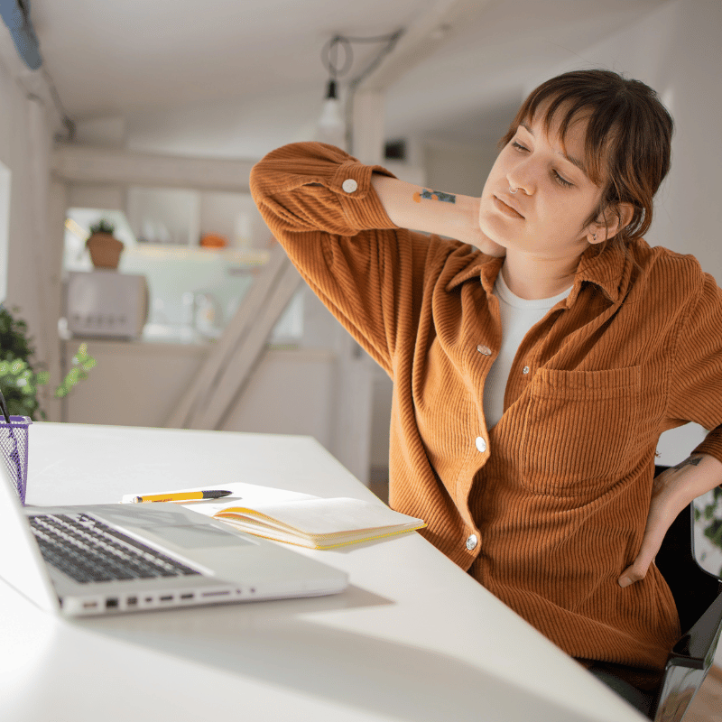 woman with neck and back pain