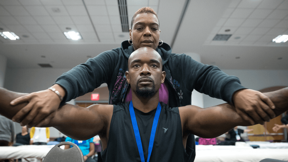 massage therapist at hands-on training at AMTA National Convention