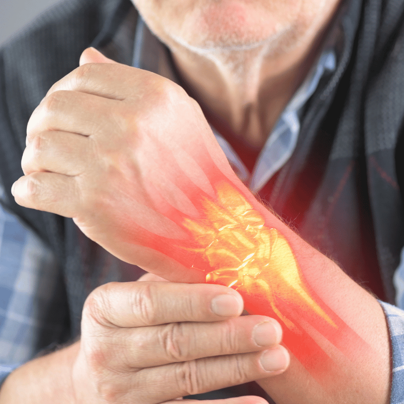 man holding wrist