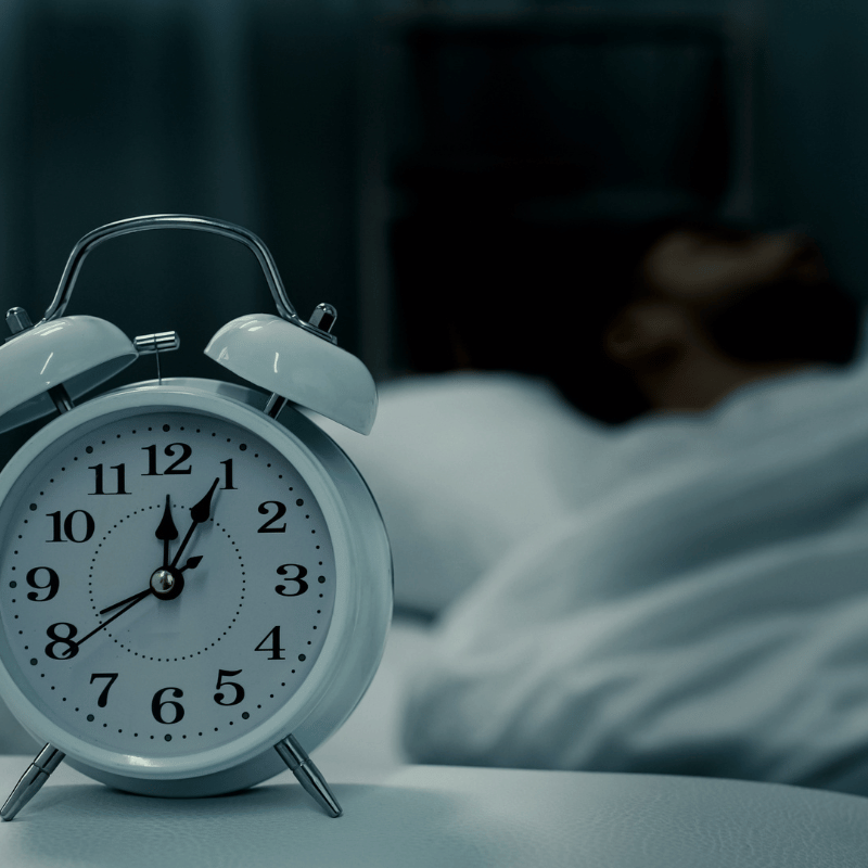 alarm clock next to bed