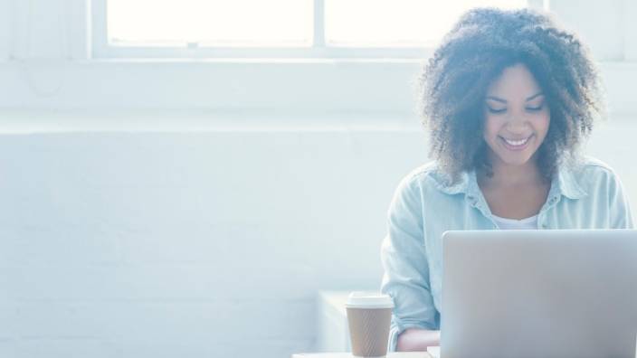 woman working on laptop computer